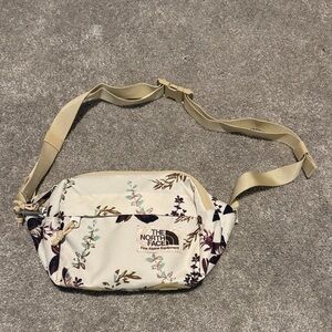 The North Face Cream and Purple Floral Crossbody Bag